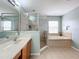 Bathroom boasts a large shower and garden tub, double vanity at 2510 Black Lake Blvd, Winter Garden, FL 34787