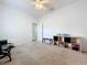 Well-lit bedroom with ceiling fan and neutral decor at 2510 Black Lake Blvd, Winter Garden, FL 34787