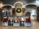 Community clubhouse lobby with comfortable seating and holiday decor at 2510 Black Lake Blvd, Winter Garden, FL 34787