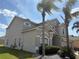 Beautiful, two story home with a two car garage, lush landscaping, and gorgeous mature palm trees at 2510 Black Lake Blvd, Winter Garden, FL 34787
