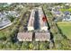 Townhome community features well-maintained landscaping, convenient parking, and nearby amenities at 607 Pensacola Ln, Lake Mary, FL 32746