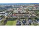 Beautiful townhome community near essential amenities, including a grocery store and medical facilities at 607 Pensacola Ln, Lake Mary, FL 32746