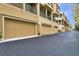 Well-maintained townhomes feature private balconies, attached garages, and convenient access at 607 Pensacola Ln, Lake Mary, FL 32746