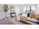 Bright bedroom with large window and ensuite bath at 66 W Harding St # B, Orlando, FL 32806