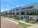 Modern townhouses with brick streets and lush landscaping at 66 W Harding St # B, Orlando, FL 32806