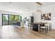 Modern kitchen with island, stainless steel appliances, and breakfast bar at 66 W Harding St # B, Orlando, FL 32806