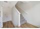 Modern light-filled staircase with carpeted steps at 66 W Harding St # B, Orlando, FL 32806