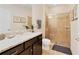 Well-appointed bathroom with a walk-in shower and vanity at 8851 Geneve Ct, Kissimmee, FL 34747