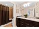 Clean bathroom with granite countertops and a shower/tub combo at 8851 Geneve Ct, Kissimmee, FL 34747