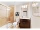 Modern bathroom with a shower and single vanity at 8851 Geneve Ct, Kissimmee, FL 34747