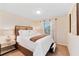 Bright bedroom with a comfortable queen-size bed and plenty of natural light at 8851 Geneve Ct, Kissimmee, FL 34747