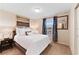 Bright bedroom with a comfortable bed and plenty of natural light at 8851 Geneve Ct, Kissimmee, FL 34747