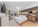 Main bedroom with a king-size bed and plenty of space at 8851 Geneve Ct, Kissimmee, FL 34747