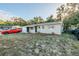 Newly renovated home with a spacious front yard at 1307 Pine Lake Rd, Orlando, FL 32808