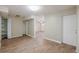 Spacious hallway with wood flooring and storage at 1307 Pine Lake Rd, Orlando, FL 32808