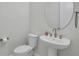 Powder room featuring tile floor, a toilet, and a vessel sink at 15155 Mayberry Dr, Winter Garden, FL 34787
