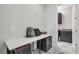 Mudroom featuring a storage area, tile floors, a closet, and built-in desk at 15155 Mayberry Dr, Winter Garden, FL 34787