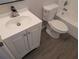 Modern bathroom with new vanity, sink, and updated fixtures at 19942 Se 155Th Pl, Umatilla, FL 32784
