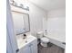Updated bathroom featuring a modern vanity, mirror, and combined shower-tub with a white surround at 19942 Se 155Th Pl, Umatilla, FL 32784