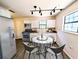 Bright kitchen features stainless steel appliances, granite counters, and modern lighting at 19942 Se 155Th Pl, Umatilla, FL 32784