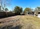 Backyard with a pergola and a partially visible deck at 2708 Sedgefield Avenue, Deltona, FL 32725