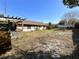 Large backyard with a pergola and shed at 2708 Sedgefield Avenue, Deltona, FL 32725