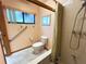 Clean bathroom with toilet, bathtub and shower at 2708 Sedgefield Avenue, Deltona, FL 32725
