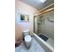 Bathroom with shower/tub combo, toilet and linen closet at 2708 Sedgefield Avenue, Deltona, FL 32725