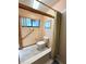 Bathroom with toilet, bathtub and shower at 2708 Sedgefield Avenue, Deltona, FL 32725