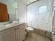 Bathroom with shower/tub, toilet and vanity at 2708 Sedgefield Avenue, Deltona, FL 32725