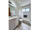 Bathroom with tub, toilet, and vanity at 2708 Sedgefield Avenue, Deltona, FL 32725