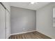 This bedroom offers wood flooring, closet and a bright window, great for natural light at 2829 Shelburne Way, St Cloud, FL 34772