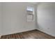 This bedroom offers wood flooring and a bright window, great for natural light at 2829 Shelburne Way, St Cloud, FL 34772