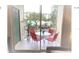 Private balcony with table and chairs, great for relaxing at 8817 Dunes Ct # 203, Kissimmee, FL 34747