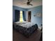 Bright bedroom with double bed, window, and closet at 1009 Fort Smith Blvd, Deltona, FL 32725