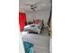 Bedroom with a queen-size bed and red curtains at 1009 Fort Smith Blvd, Deltona, FL 32725