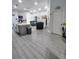 Open concept living area with kitchen and living room at 1009 Fort Smith Blvd, Deltona, FL 32725
