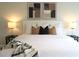 Comfortable bedroom with a well-made bed and matching nightstands at 11637 Meadow Grove Cir, Orlando, FL 32836