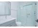Clean bathroom showcasing a glass shower, a modern vanity, and lots of light at 13779 Abberwick Dr, Orlando, FL 32832