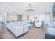 Open-concept living and kitchen area is bright and inviting, with modern furniture and a seamless flow for entertaining and relaxation at 13779 Abberwick Dr, Orlando, FL 32832