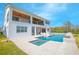A stunning two-story home with a private pool and spa, perfect for outdoor entertaining and relaxation at 13779 Abberwick Dr, Orlando, FL 32832