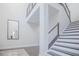 Modern staircase with metal railings and a bright, open design at 13779 Abberwick Dr, Orlando, FL 32832