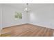 Dining room featuring fresh paint, new floors and a modern light fixture at 514 S 7Th St, Lake Wales, FL 33853