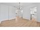 Dining room featuring fresh paint, new floors and an arched doorway at 514 S 7Th St, Lake Wales, FL 33853