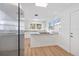 Bright kitchen featuring stainless steel appliances, granite countertops, and wood-look flooring at 514 S 7Th St, Lake Wales, FL 33853