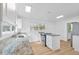 Updated kitchen features granite countertops, an island and modern stainless-steel appliances at 514 S 7Th St, Lake Wales, FL 33853