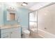 Clean bathroom with a shower/tub combo and modern vanity at 7 Huntley Ct., Haines City, FL 33844