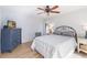 Bright bedroom with a comfortable bed and built-in dresser at 7 Huntley Ct., Haines City, FL 33844