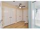 Large walk-in closet with double doors and ample shelving at 7 Huntley Ct., Haines City, FL 33844