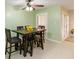 Dining area with table and chairs, located near the kitchen at 7 Huntley Ct., Haines City, FL 33844